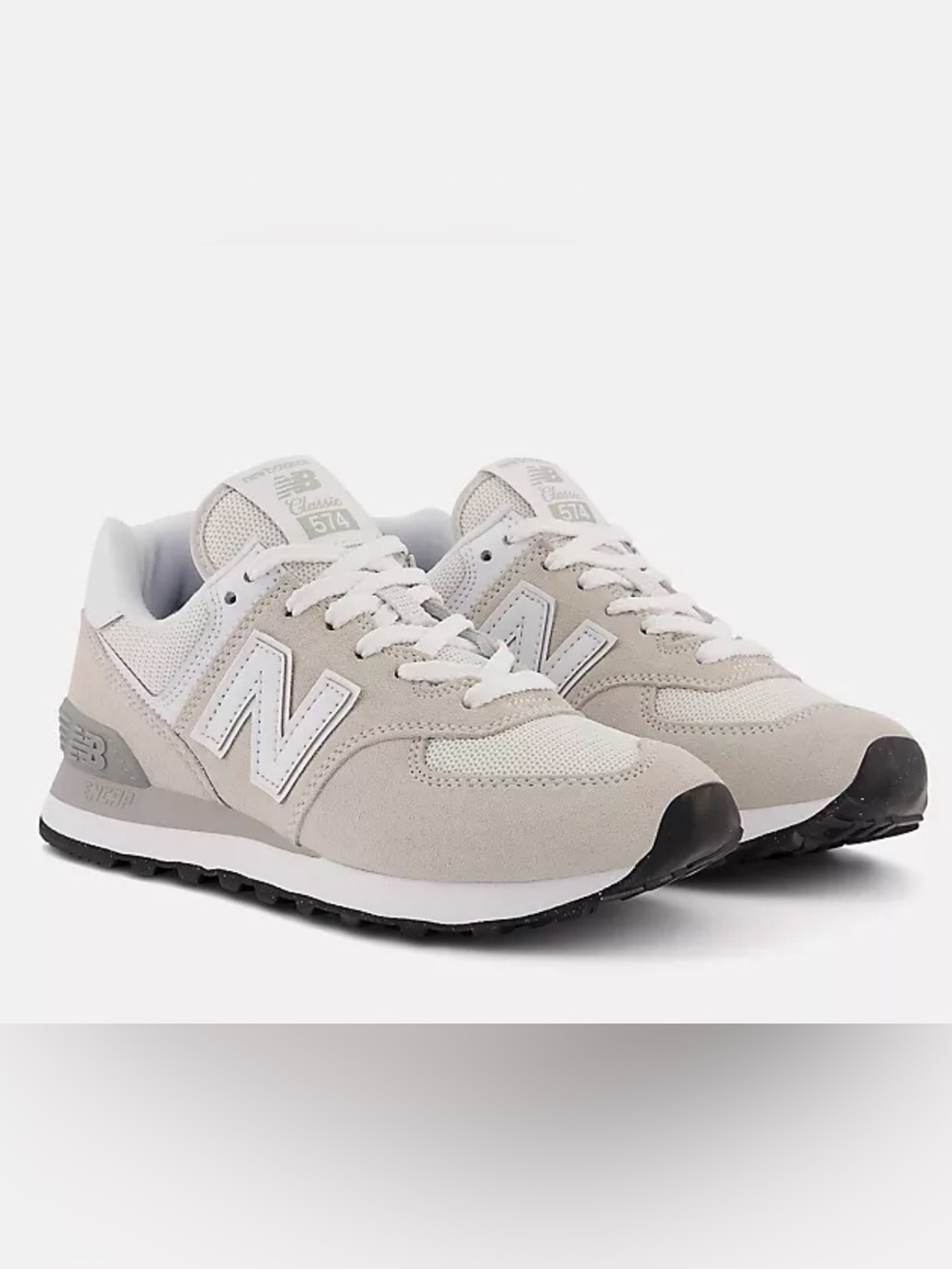 New Balance sneakers in Light Grey and White. 
4.5y / 6w